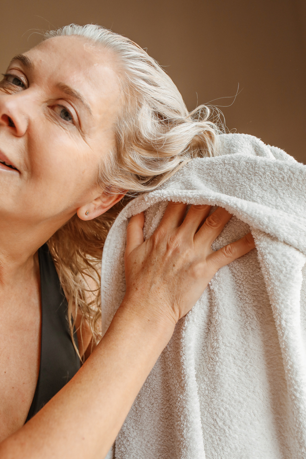 Elderly Woman Drying Her Hair with Towel